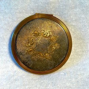 Antique compact